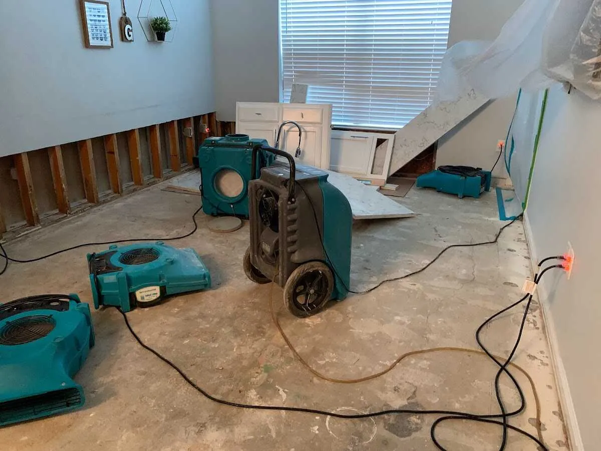Dehumidifier in flood-cut room for Water Damage Restoration in Kula